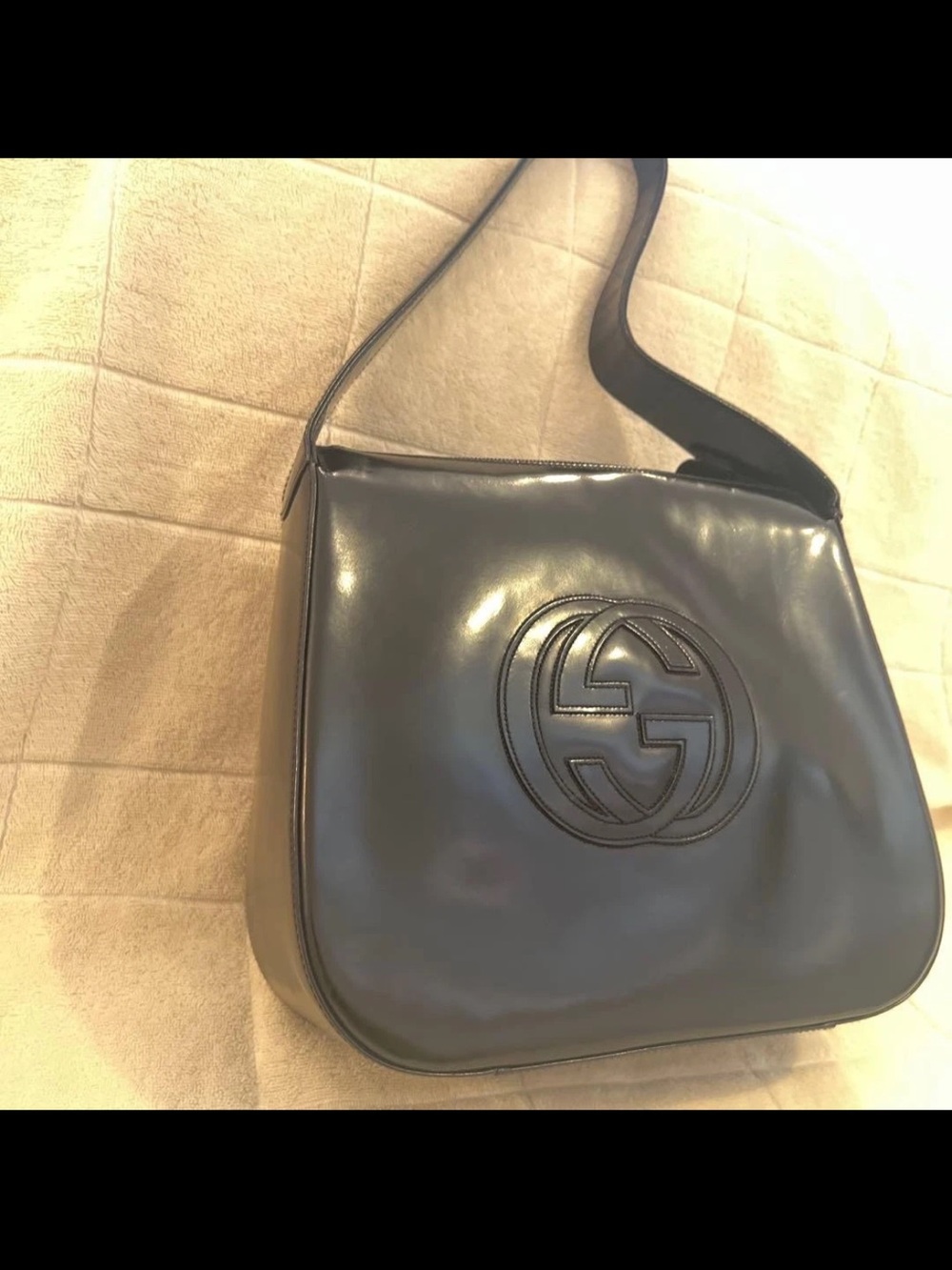 Gucci Glossy Black Leather Shoulder Bag with Raised GG Emblem